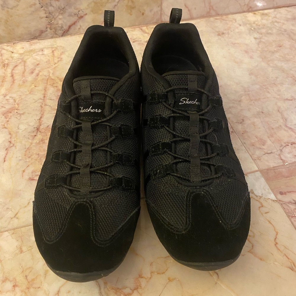 Skechers all black Slip on Sneakers